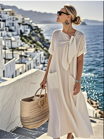 Marblestitch™ | Lång klänning med rosettdetalj